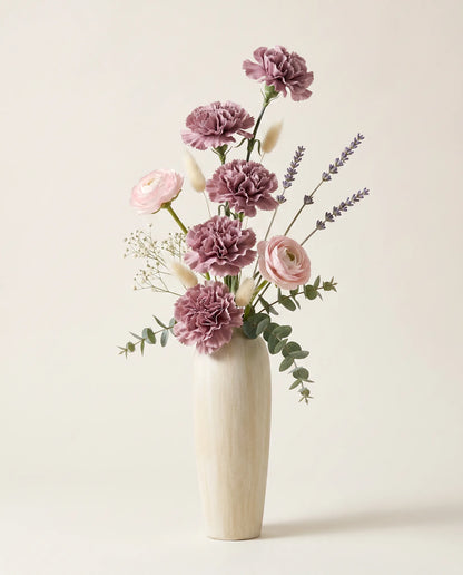 Vase céramique crème cannelé avec bouquet romantique violet et rose artificiel