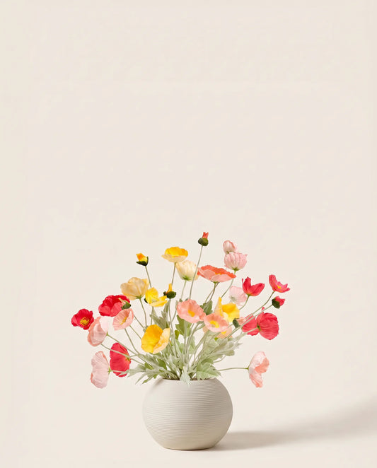 Bouquet artificiel de pavots d'Islande multicolores dans un vase en céramique