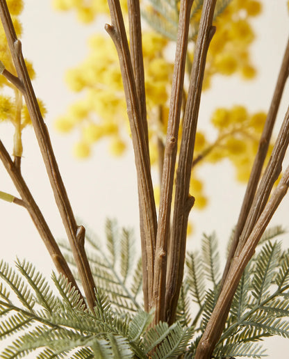 Détail des feuilles gris-vert et des tiges du bouquet artificiel Soleil d'Hiver